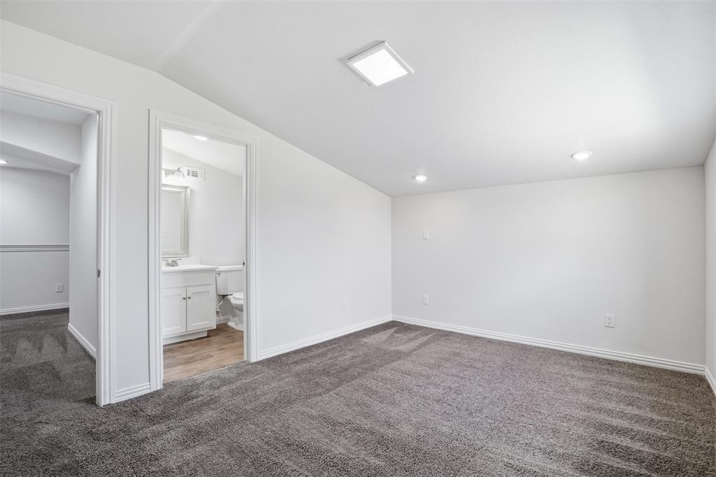 103 West Cleburne Road Crowley, TX 76036 - Photo 15 of 18 an empty room with a bathroom