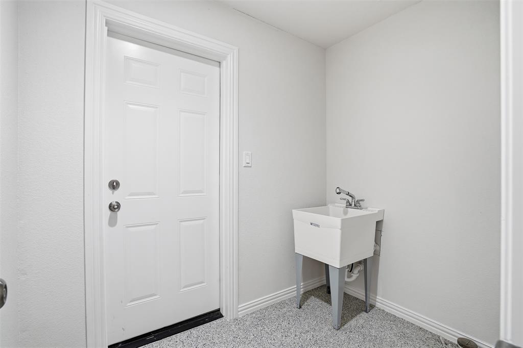 103 West Cleburne Road Crowley, TX 76036 - Photo 8 of 18 a bathroom with a sink
