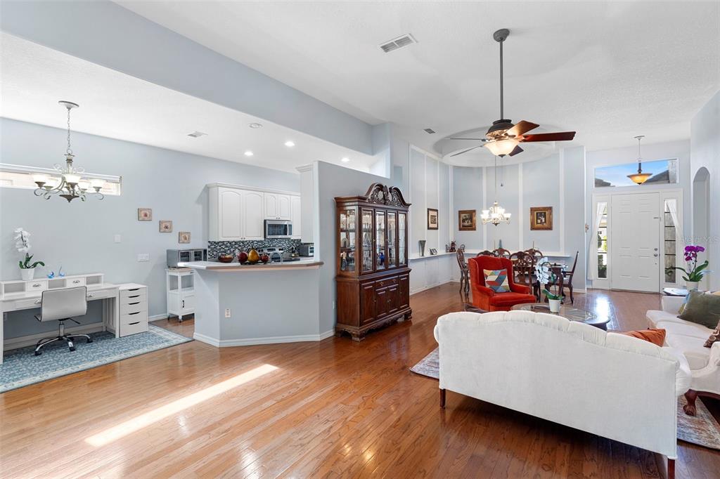 440 Sotheby Way DeBary, FL 32713 - Photo 19 of 37 a view of a kitchen and dining room