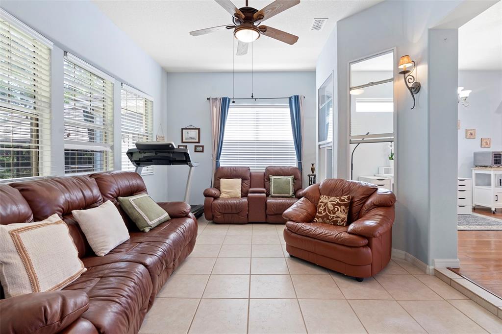 440 Sotheby Way DeBary, FL 32713 - Photo 20 of 37 a living room with furniture and a window