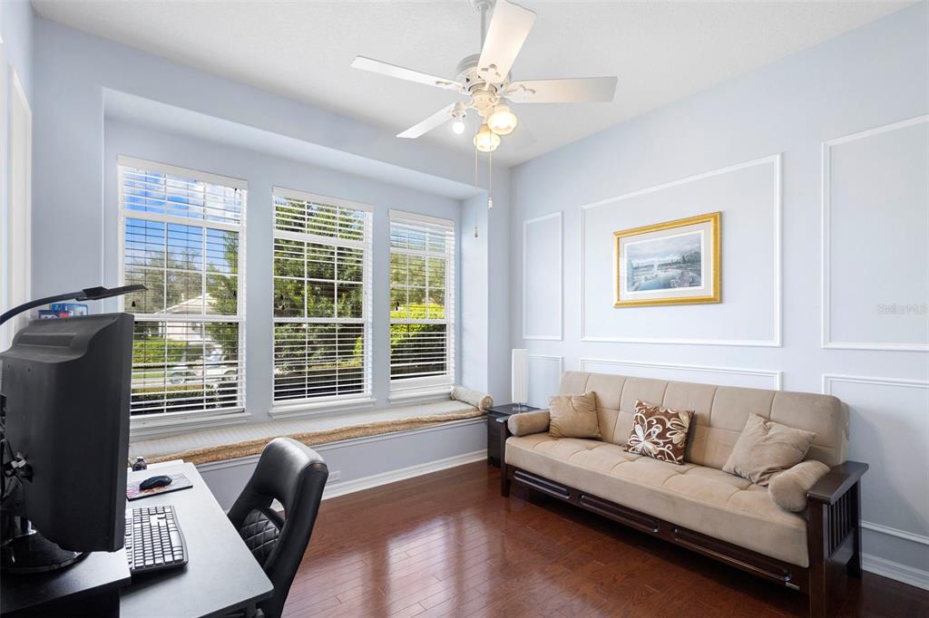 440 Sotheby Way DeBary, FL 32713 - Photo 9 of 37 a living room with furniture and a large window
