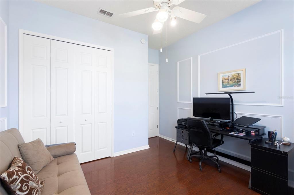 440 Sotheby Way DeBary, FL 32713 - Photo 10 of 37 a view of a workspace with furniture and a ceiling fan