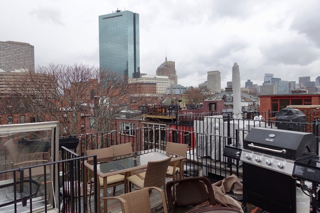 a view of a city with tall buildings