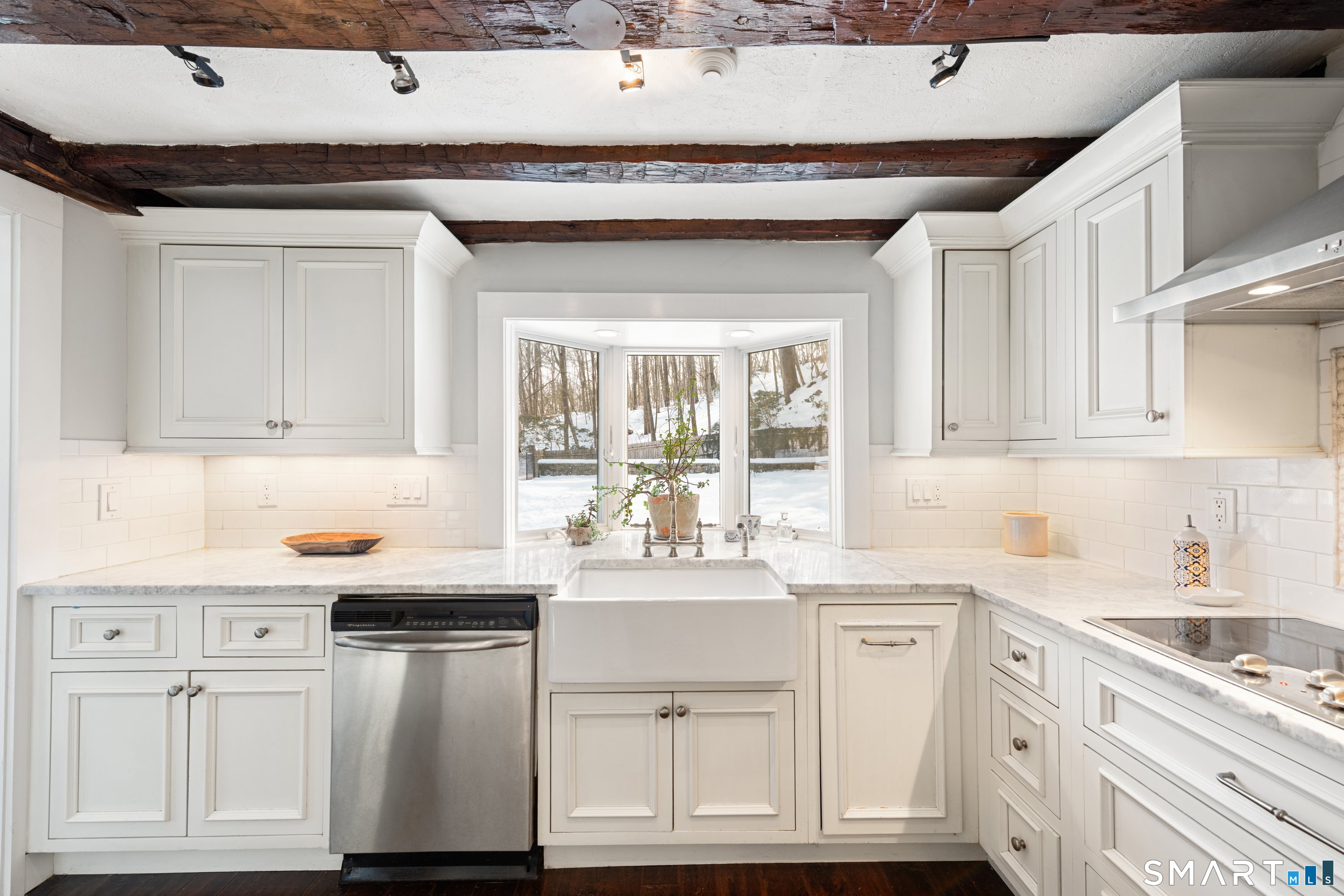 138 Putnam Park Road Bethel, CT 06801 - Photo 15 of 40 a kitchen with granite countertop a sink and cabinets