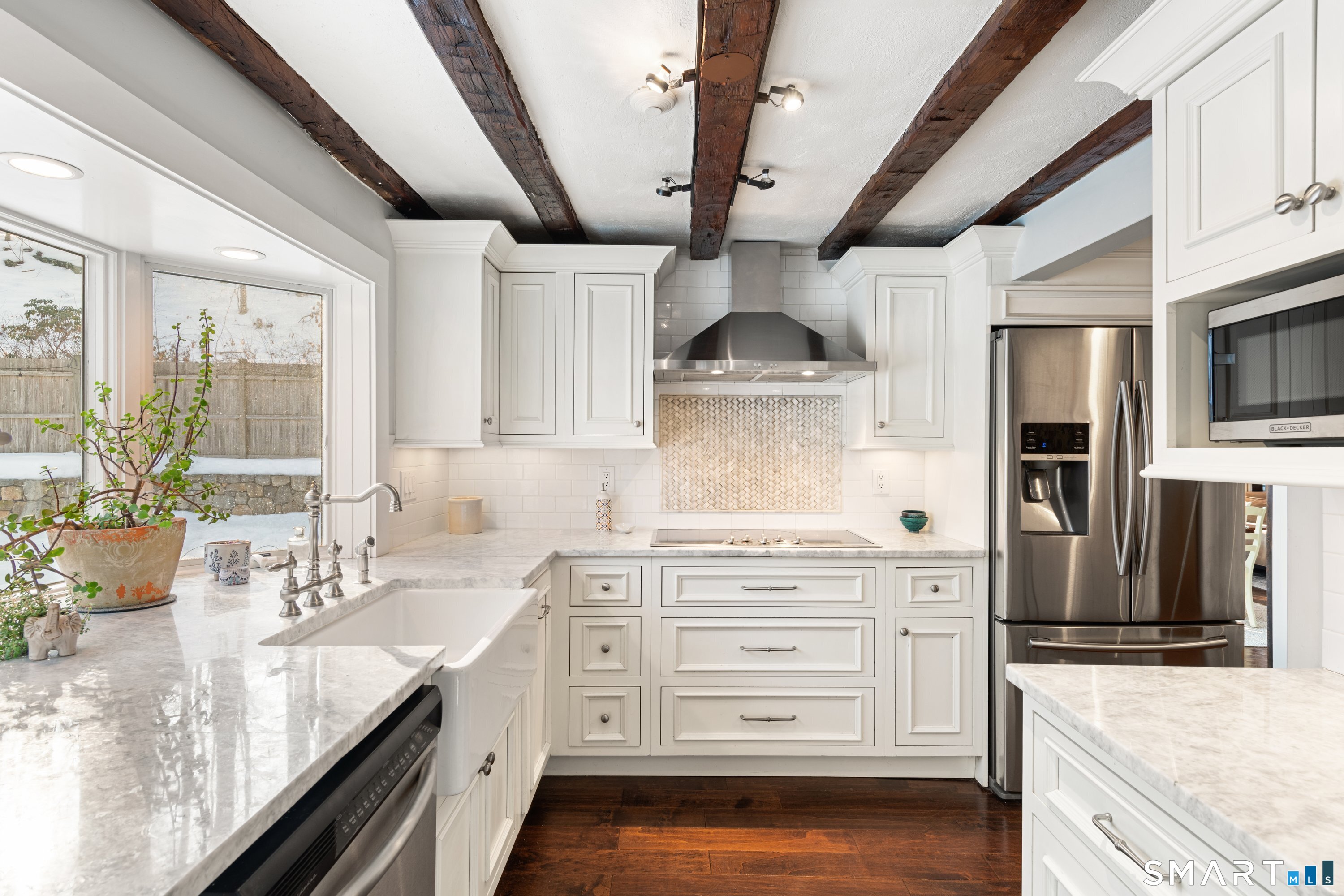 138 Putnam Park Road Bethel, CT 06801 - Photo 18 of 40 a kitchen with stainless steel appliances granite countertop a sink a stove and cabinets