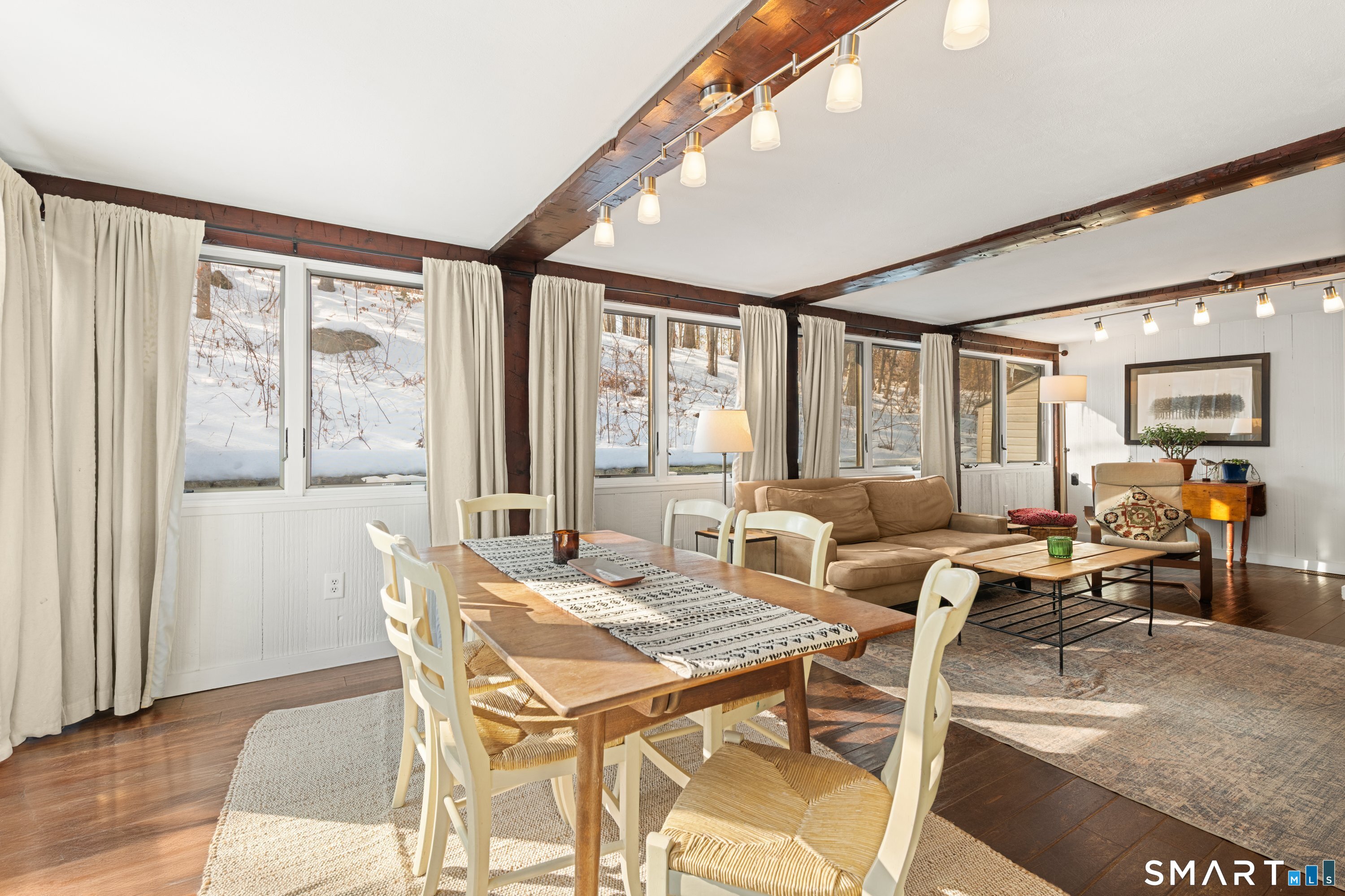 138 Putnam Park Road Bethel, CT 06801 - Photo 19 of 40 a view of a dining room with furniture window and outside view