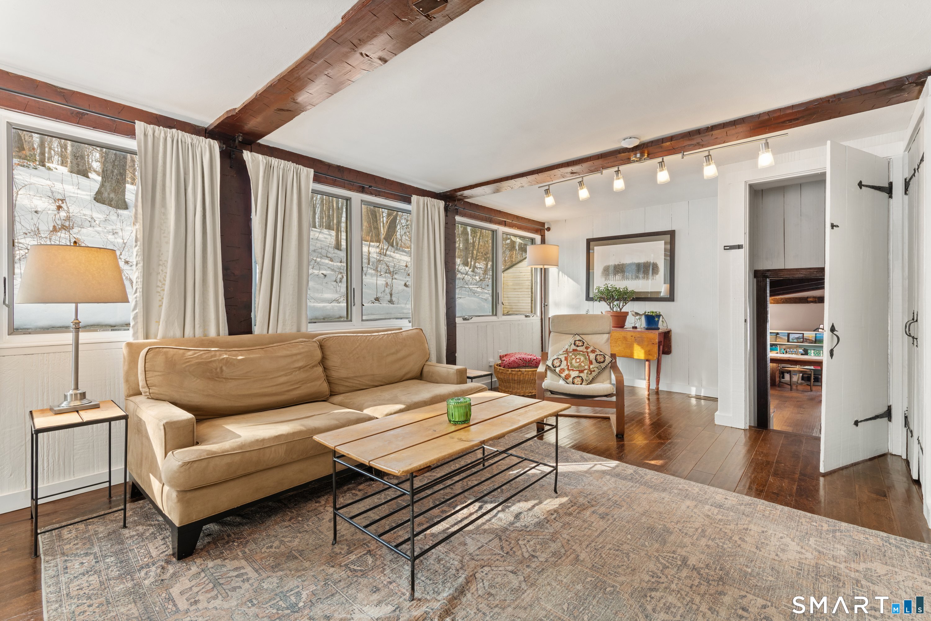 138 Putnam Park Road Bethel, CT 06801 - Photo 20 of 40 a living room with furniture and a window