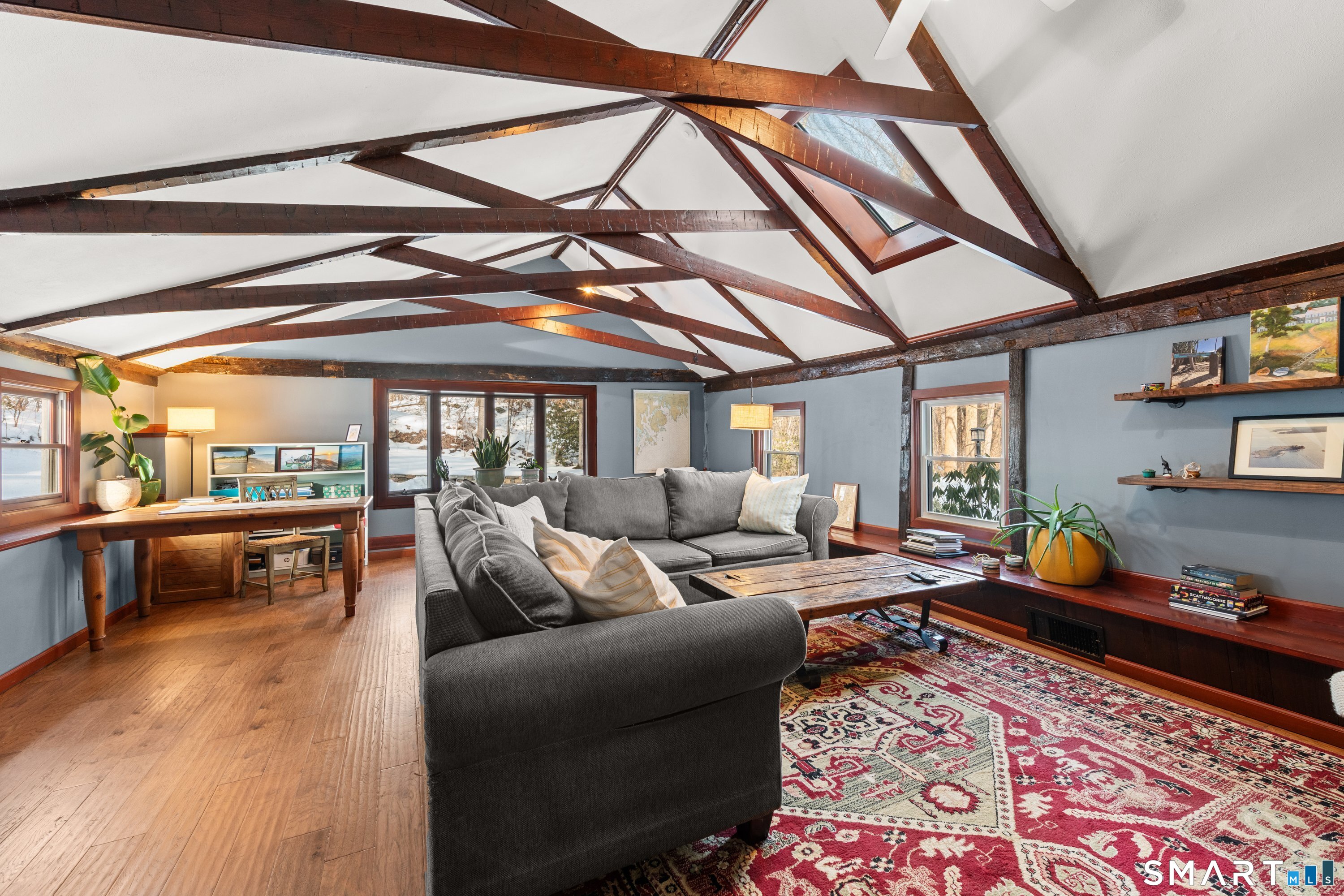 138 Putnam Park Road Bethel, CT 06801 - Photo 24 of 40 a living room with furniture and a wooden floor