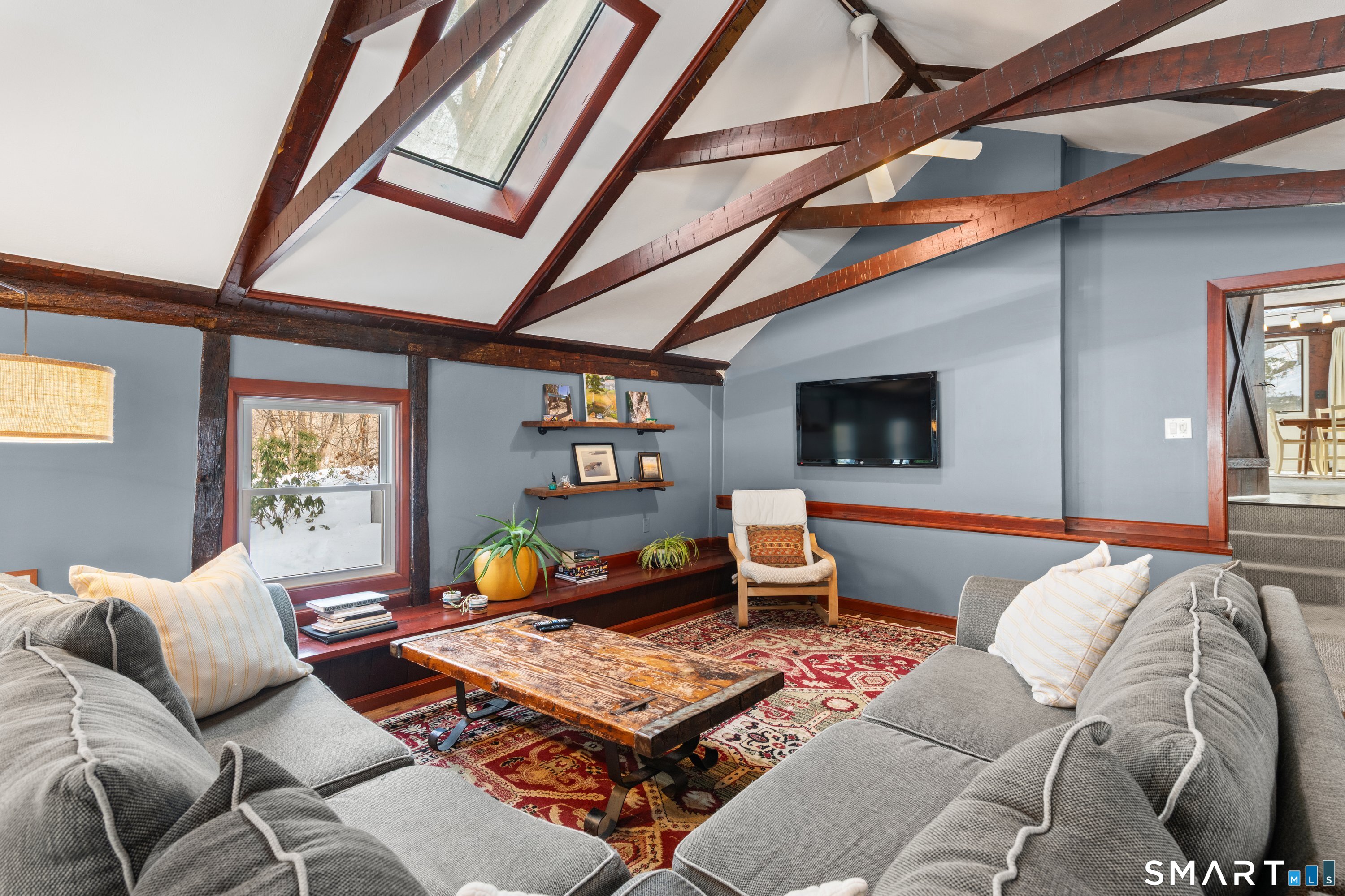 138 Putnam Park Road Bethel, CT 06801 - Photo 25 of 40 a living room with furniture and flat screen tv