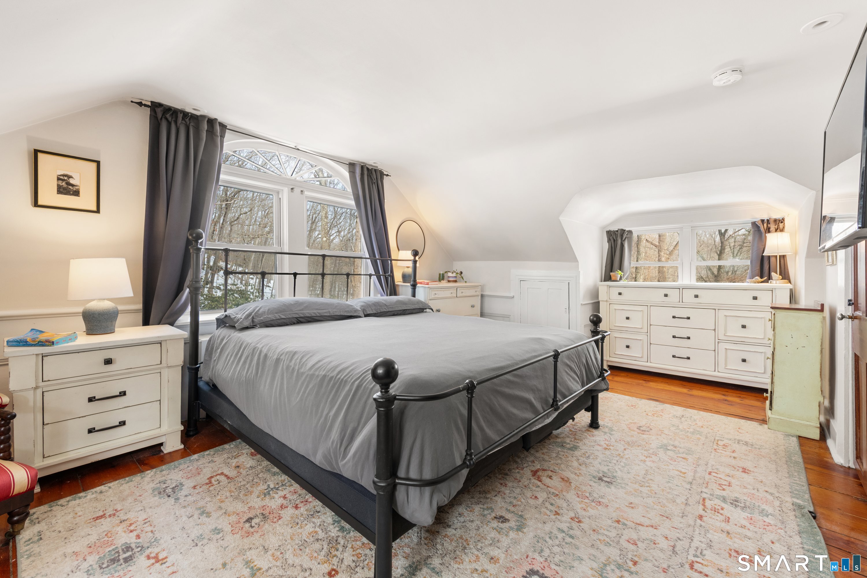 138 Putnam Park Road Bethel, CT 06801 - Photo 34 of 40 a bedroom with a bed and a dresser