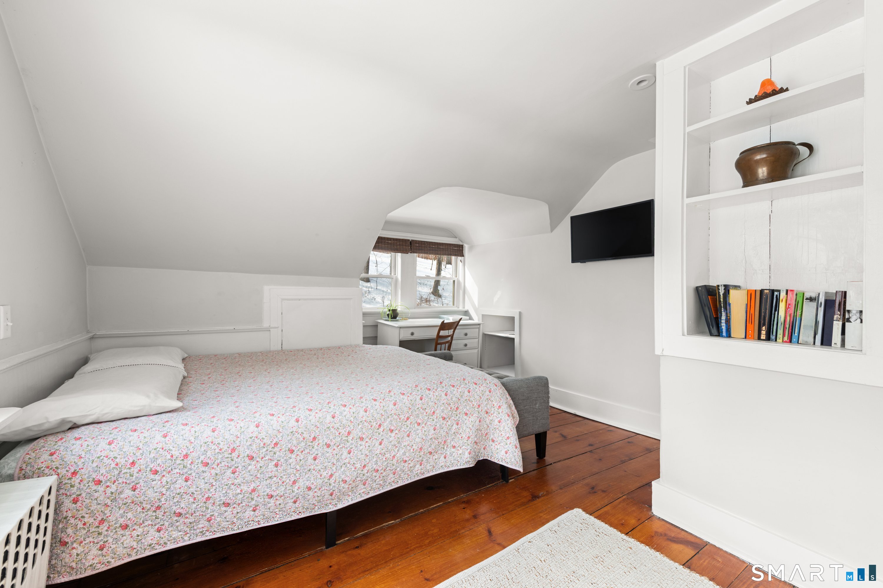 138 Putnam Park Road Bethel, CT 06801 - Photo 36 of 40 a bedroom with a bed and a window