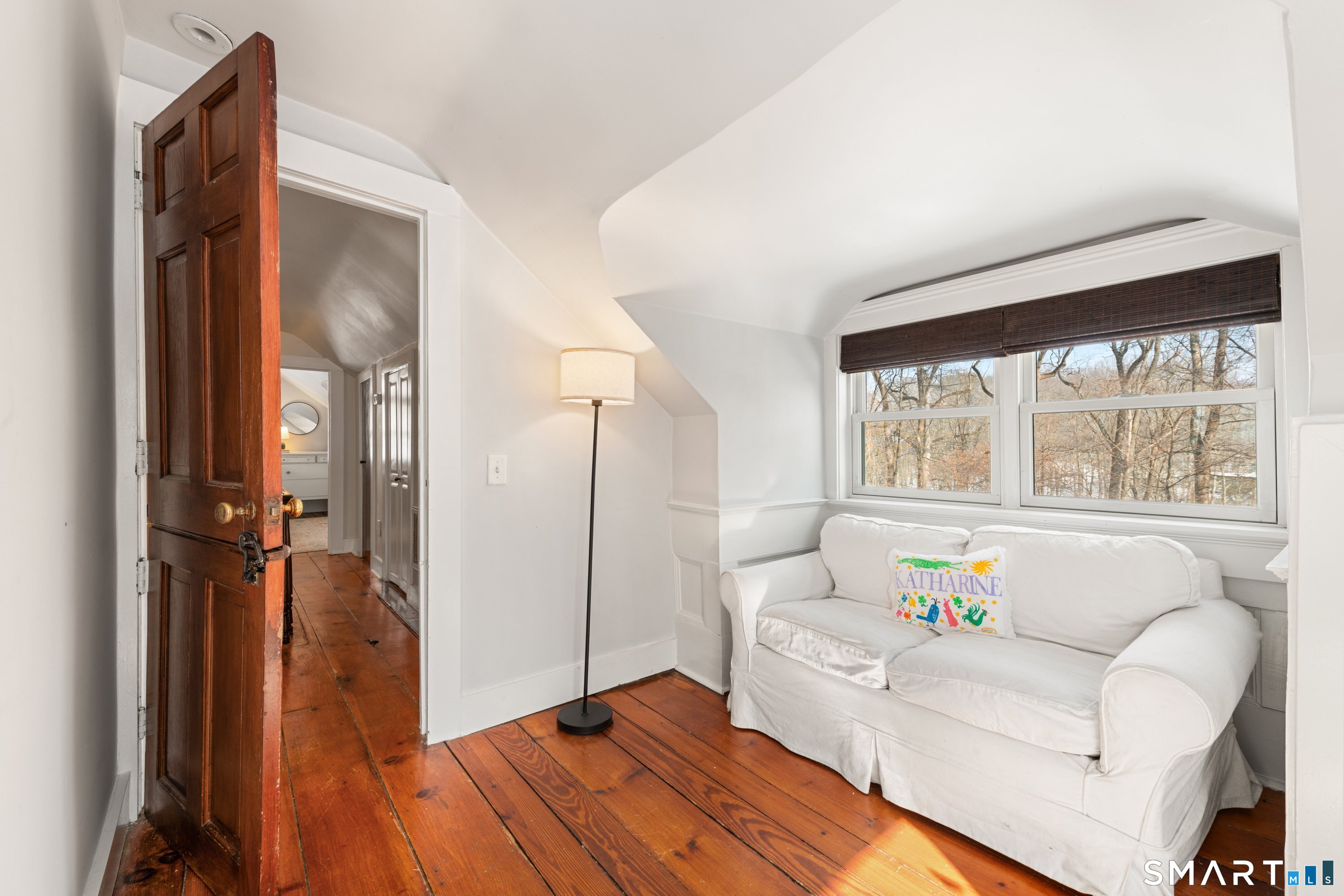 138 Putnam Park Road Bethel, CT 06801 - Photo 37 of 40 a living room with furniture and a large window