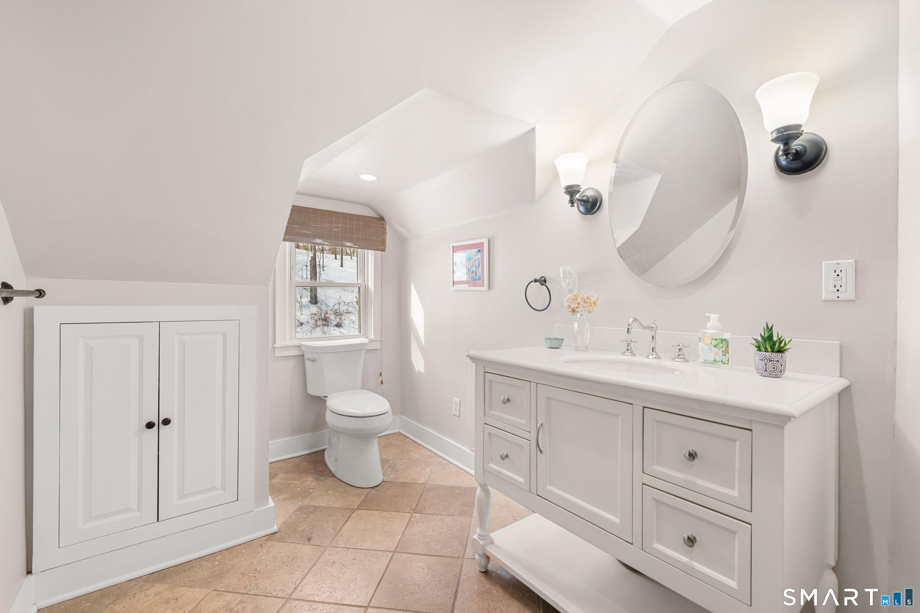 138 Putnam Park Road Bethel, CT 06801 - Photo 38 of 40 a spacious bathroom with a double vanity sink and a mirror