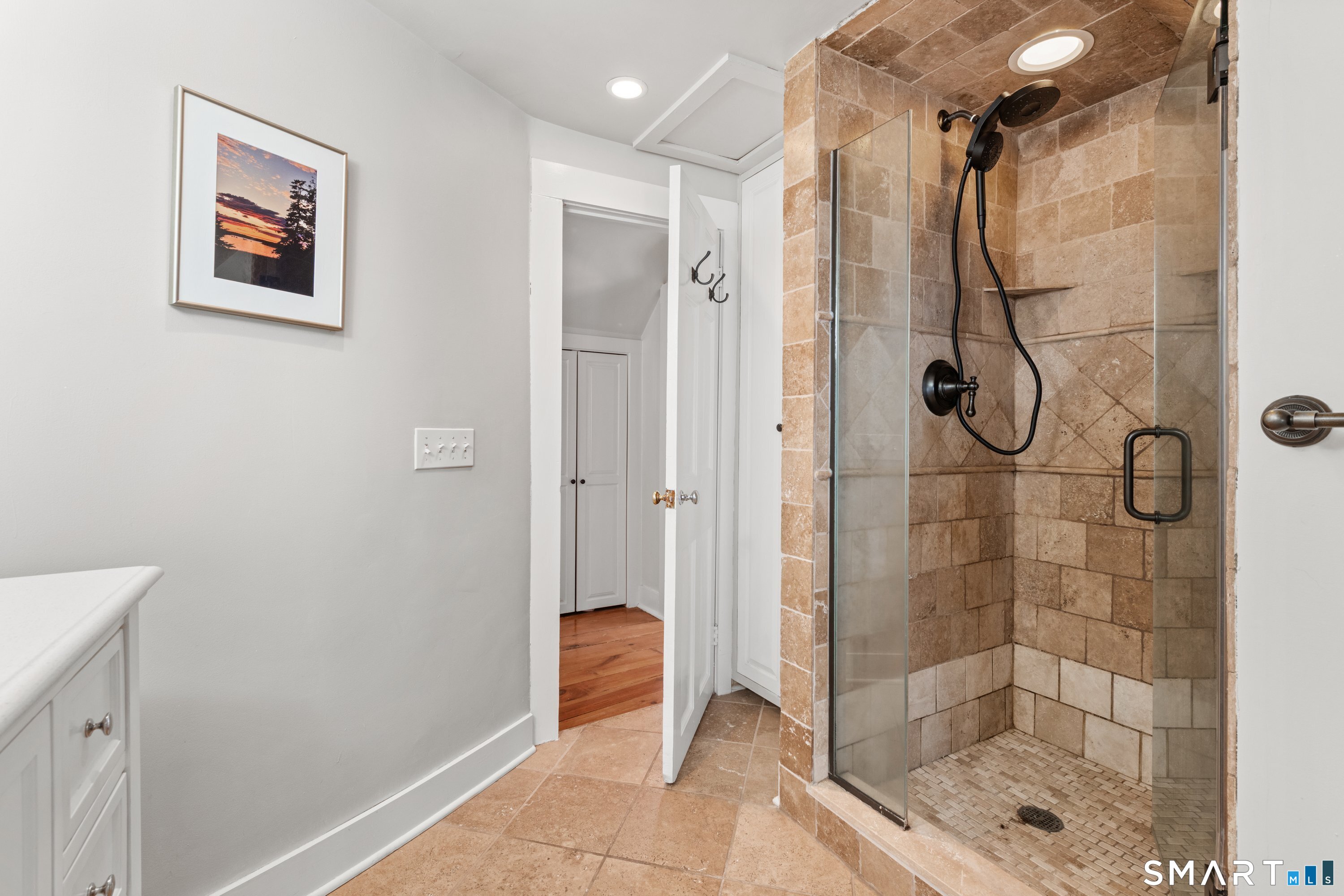 138 Putnam Park Road Bethel, CT 06801 - Photo 39 of 40 a bathroom with a glass shower door