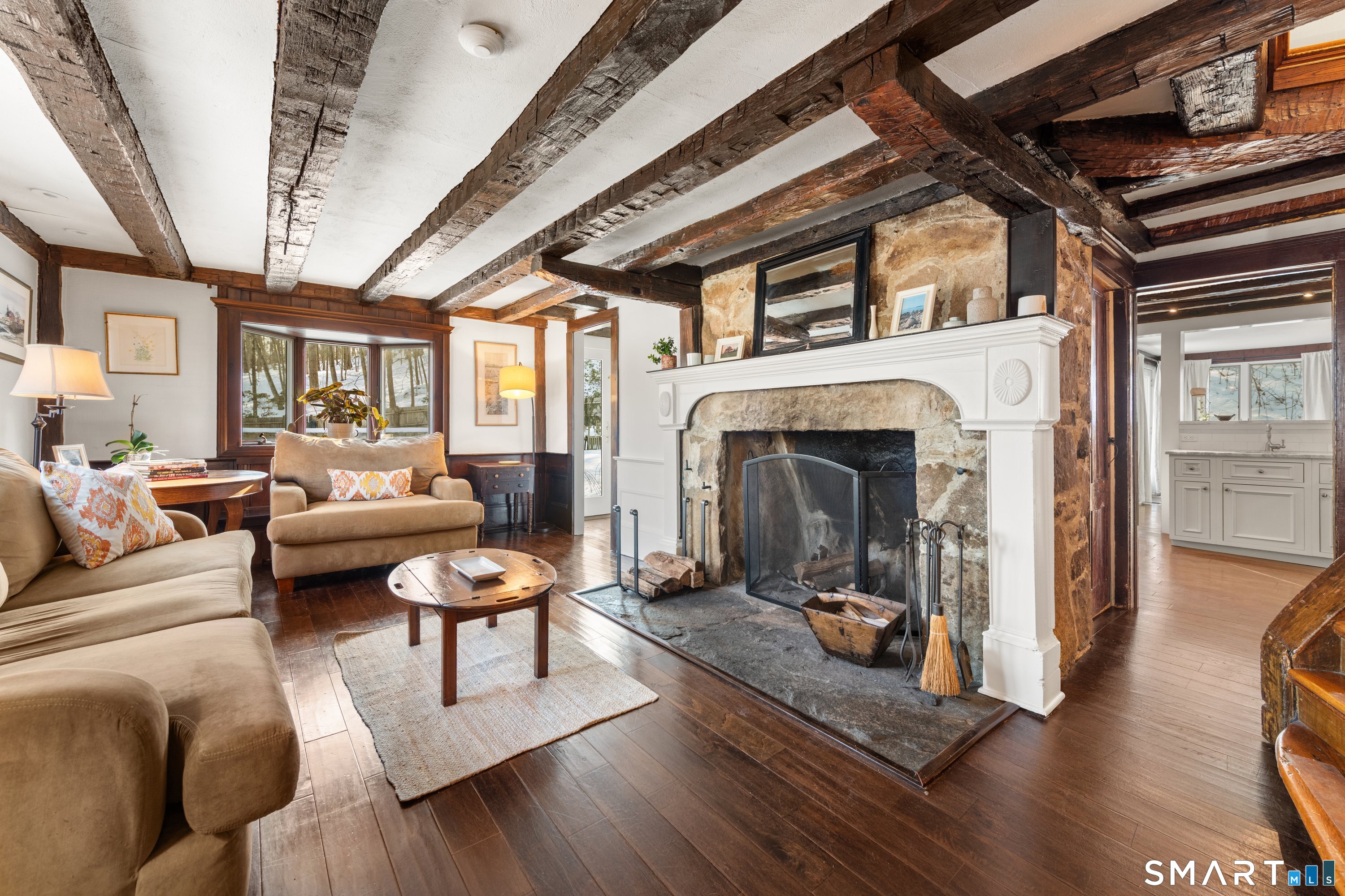 138 Putnam Park Road Bethel, CT 06801 - Photo 10 of 40 a living room with furniture and a fireplace