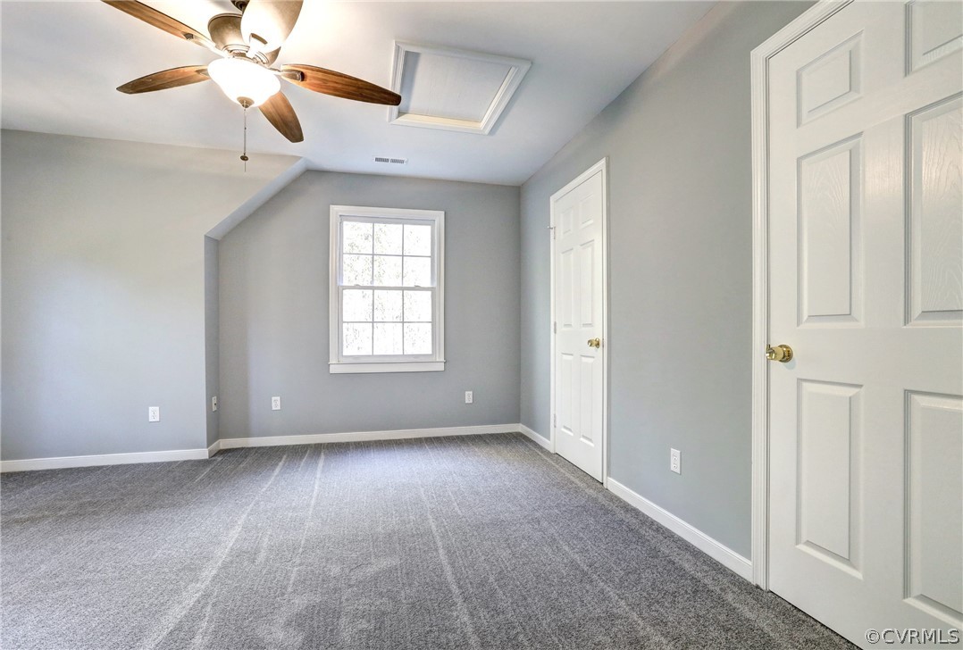 2330 Brookforest Road Midlothian, VA 23112 - Photo 17 of 31 a view of an empty room with window and chandelier fan