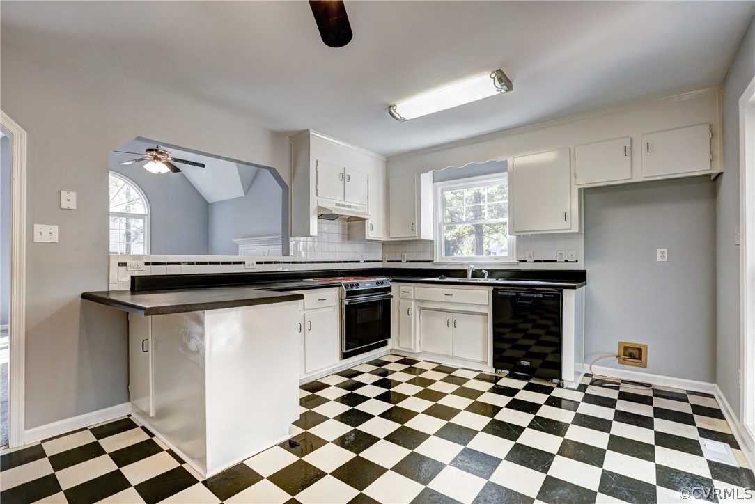 2330 Brookforest Road Midlothian, VA 23112 - Photo 10 of 31 a kitchen with a checkered floor and white appliances