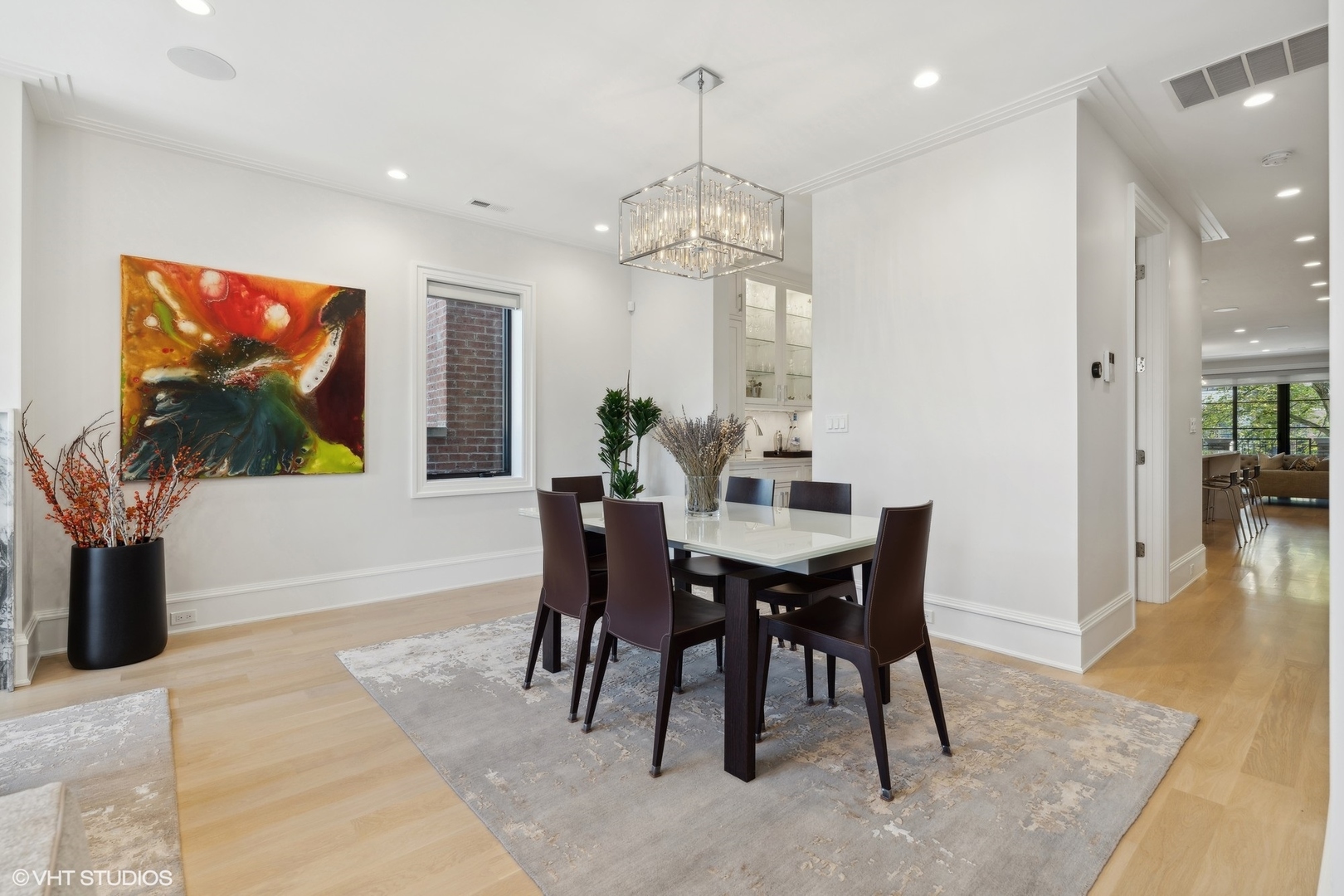 1940 North Mohawk Street, Unit 3 Chicago, IL 60614 - Photo 15 of 33 a view of a dining room with furniture and wooden floor