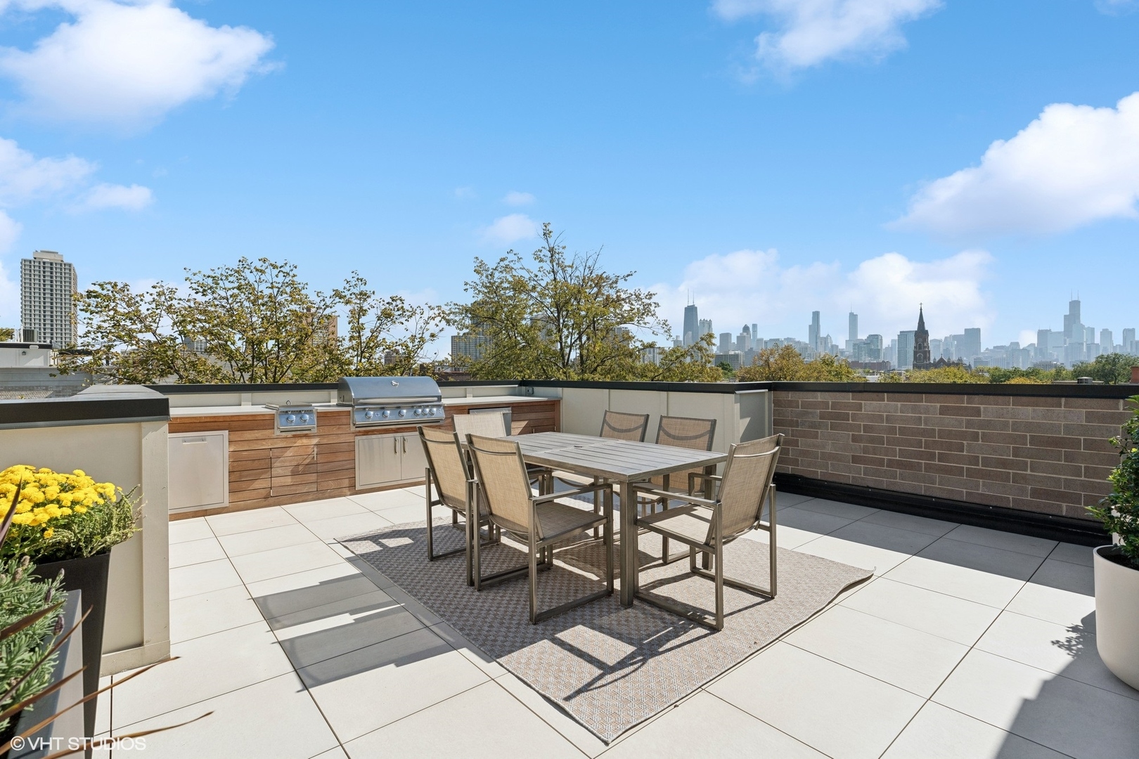 1940 North Mohawk Street, Unit 3 Chicago, IL 60614 - Photo 27 of 33 a patio with water view and a terrace