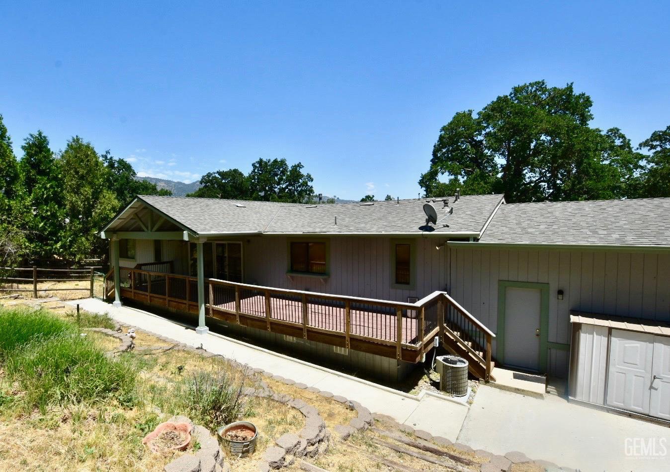 Undisclosed Address Tehachapi, CA 93561 - Photo 13 of 16 a view of a terrace with a bench