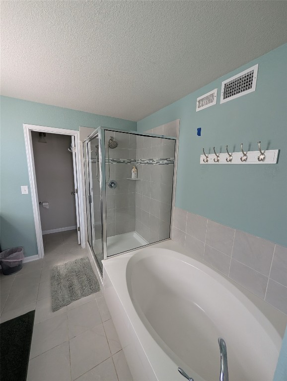 1269 Nevarez Kyle, TX 78640 - Photo 11 of 30 a spacious bathroom with a bathtub and a shower
