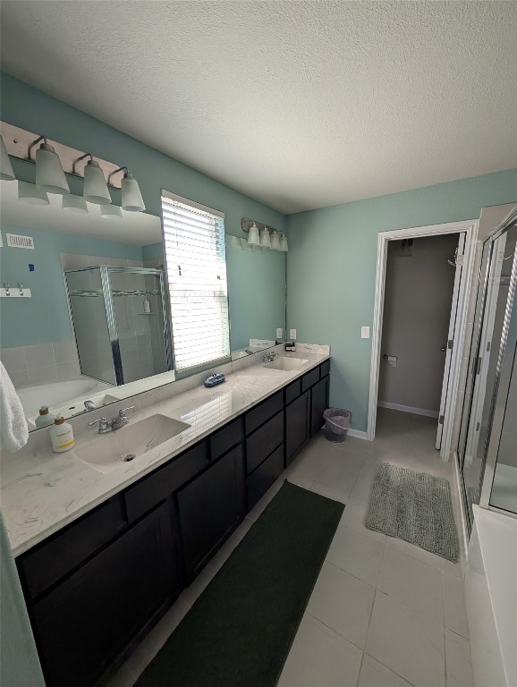 1269 Nevarez Kyle, TX 78640 - Photo 12 of 30 a bathroom with a double vanity sink and mirror