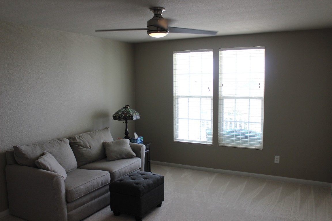 1269 Nevarez Kyle, TX 78640 - Photo 17 of 30 a living room with furniture and a window