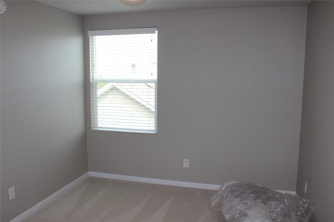 1269 Nevarez Kyle, TX 78640 - Photo 18 of 30 an empty room with a window