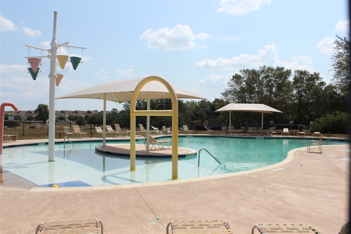 1269 Nevarez Kyle, TX 78640 - Photo 28 of 30 a view of a swimming pool with couches chairs and swimming pool