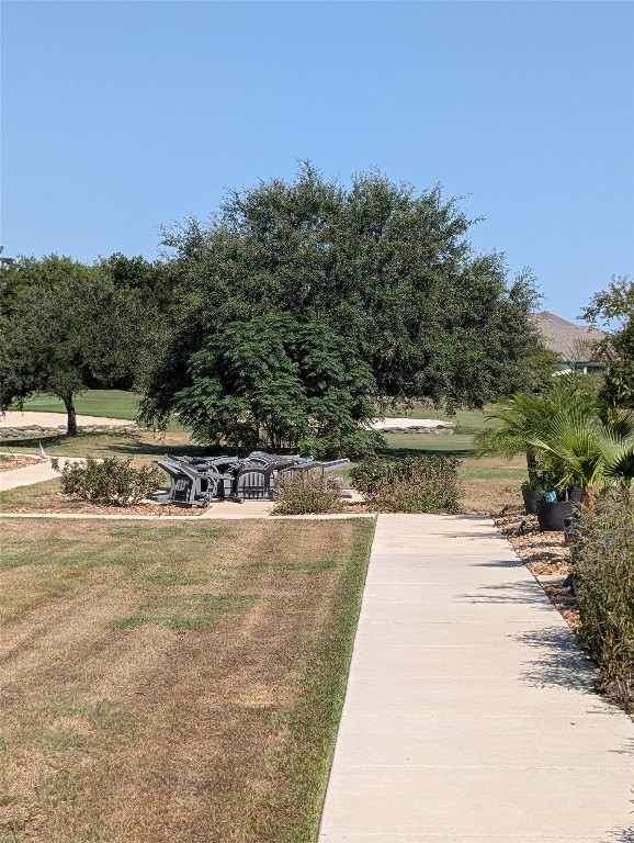 1269 Nevarez Kyle, TX 78640 - Photo 3 of 30 a view of a yard with an outdoor space