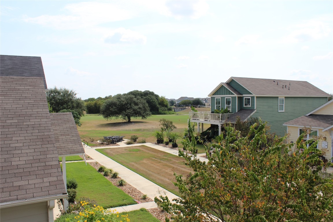1269 Nevarez Kyle, TX 78640 - Photo 10 of 30 a view of a house with a yard and sitting area