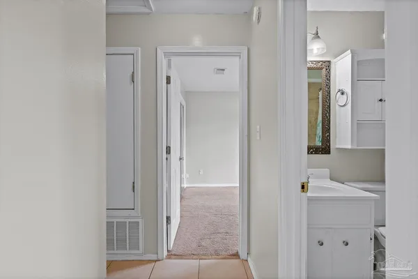 a bathroom with a shower and a sink