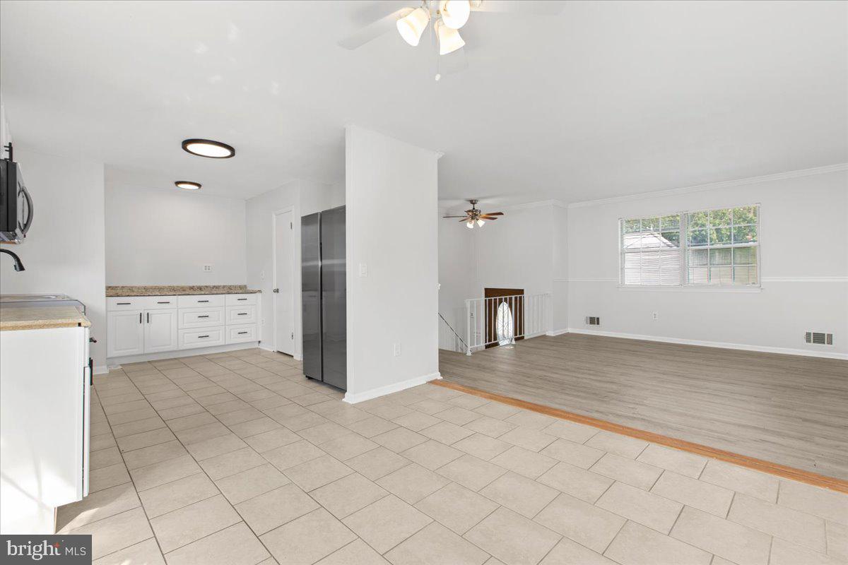 325 Londontown Road Edgewater, MD 21037 - Photo 12 of 34 a view of a kitchen with a sink and a refrigerator