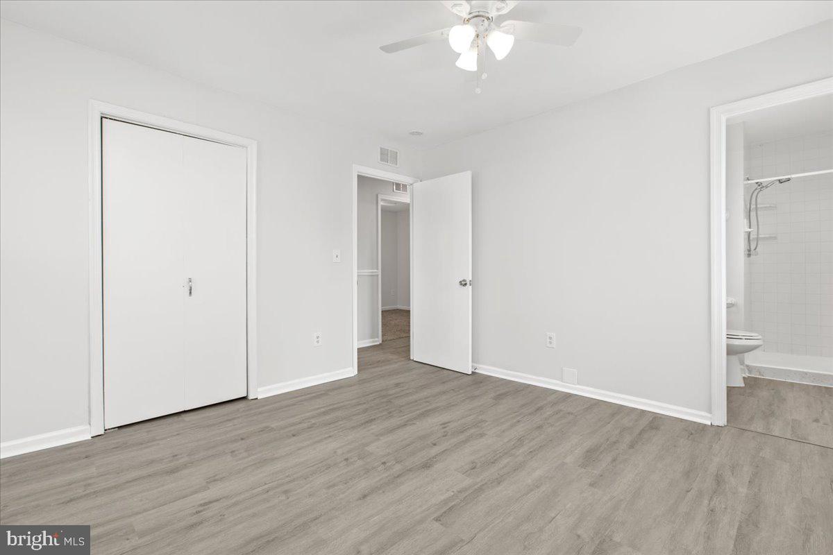 325 Londontown Road Edgewater, MD 21037 - Photo 13 of 34 a view of an empty room with wooden floor