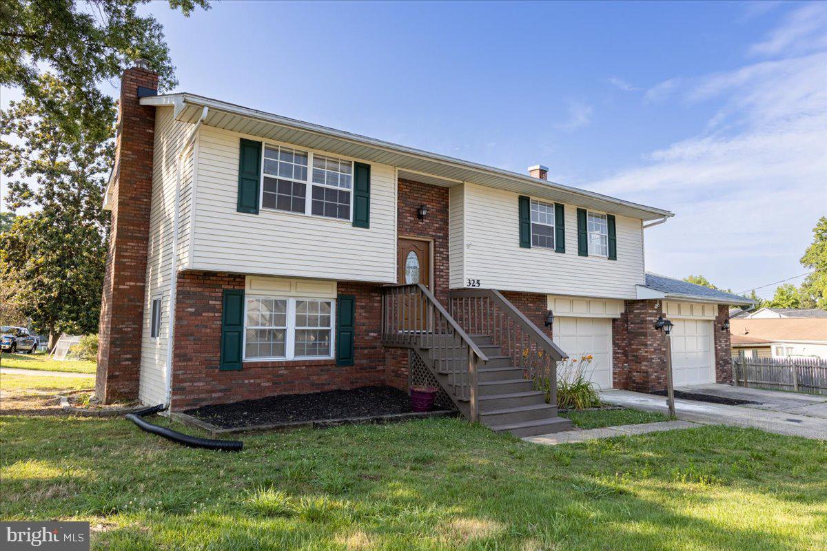 325 Londontown Road Edgewater, MD 21037 - Photo 2 of 34 a view of a house with a yard