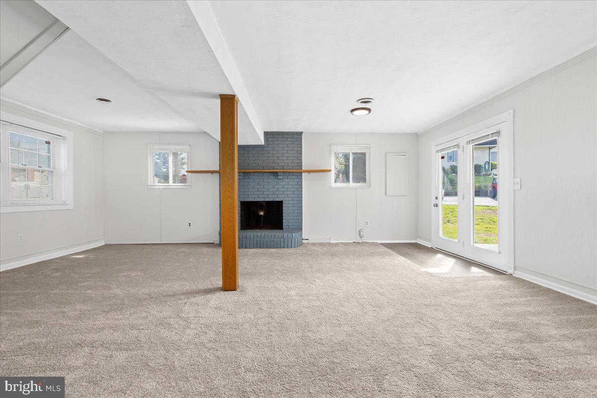 325 Londontown Road Edgewater, MD 21037 - Photo 22 of 34 a view of empty room with a fireplace and window
