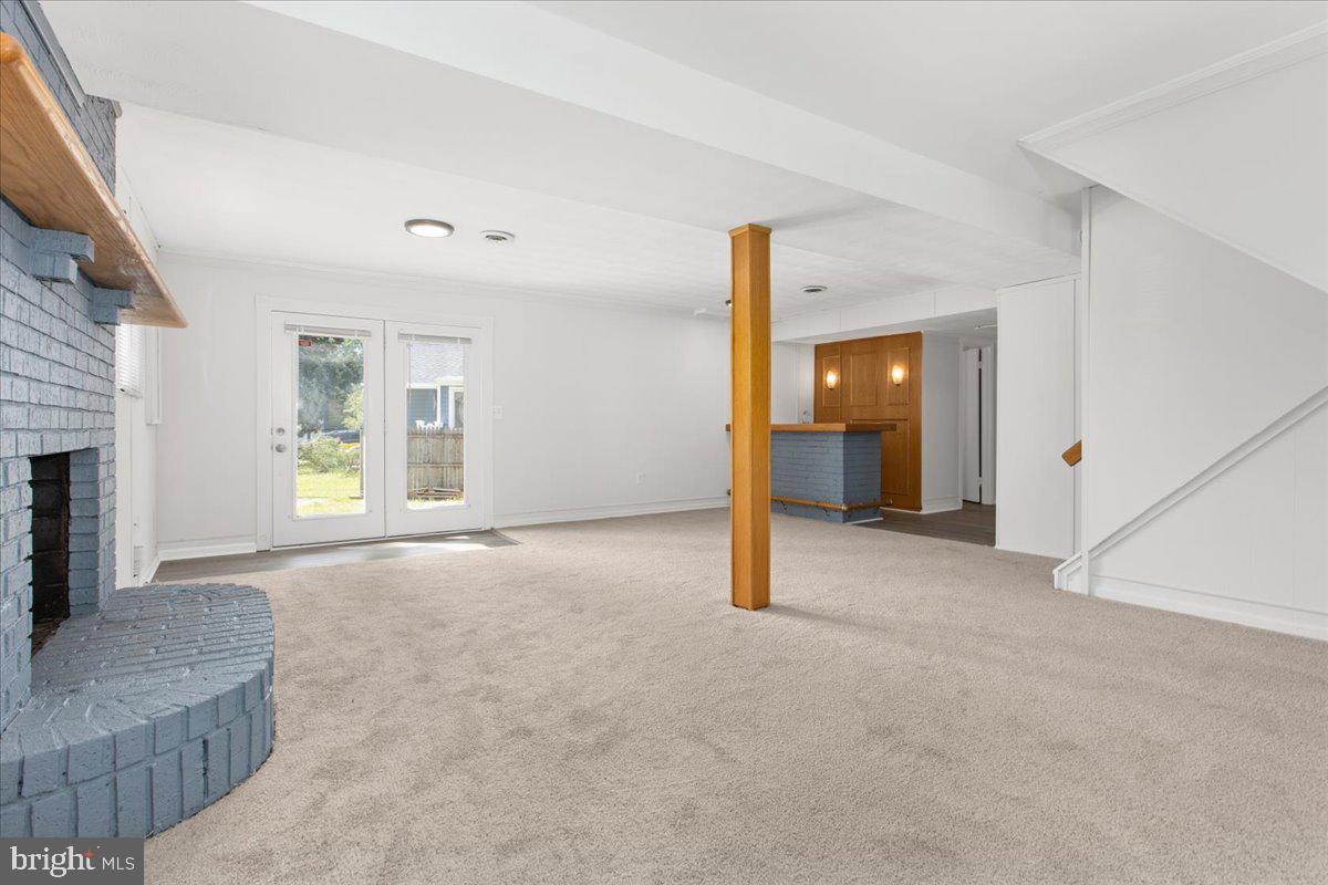 325 Londontown Road Edgewater, MD 21037 - Photo 23 of 34 a view of an empty room with a fireplace