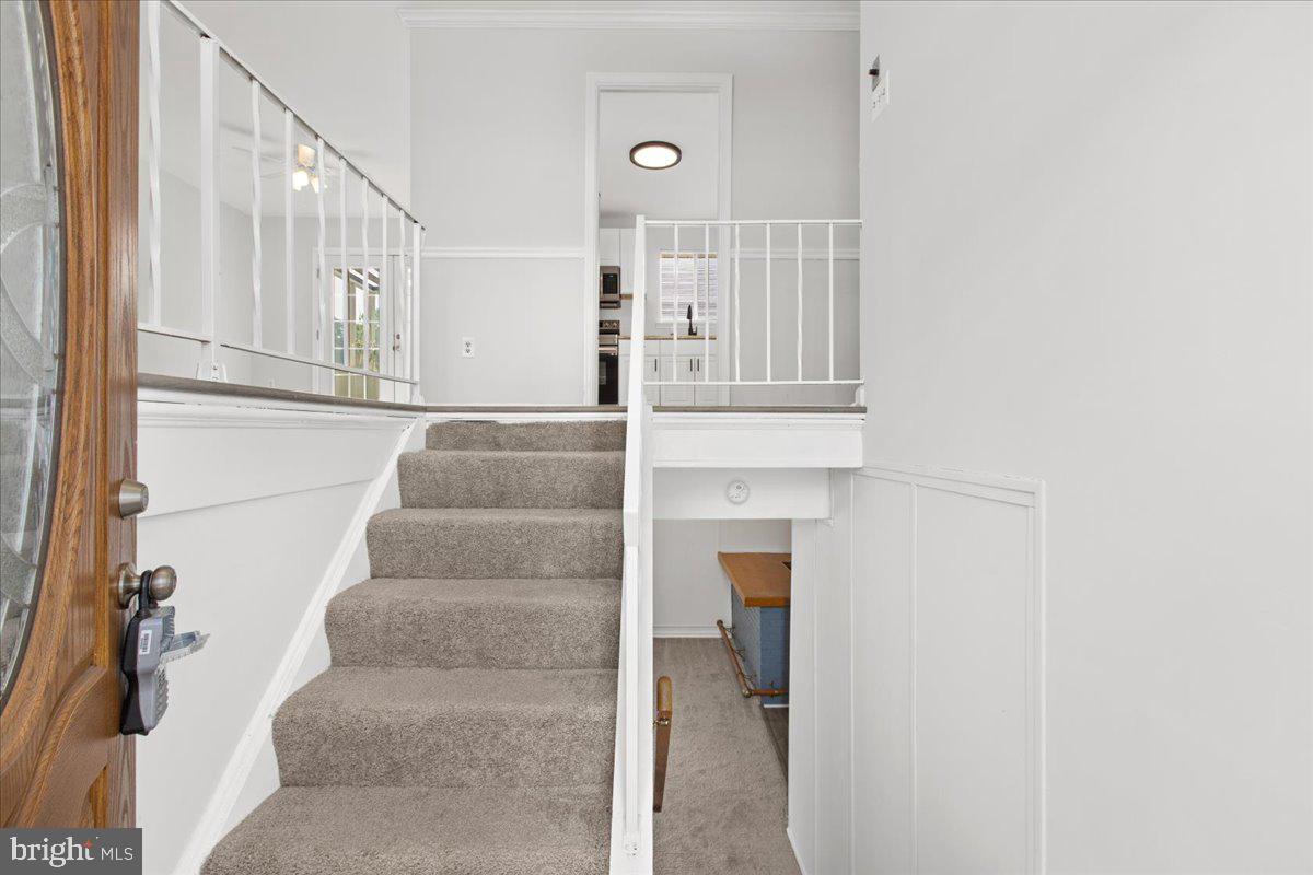 325 Londontown Road Edgewater, MD 21037 - Photo 4 of 34 a view of staircase with white walls