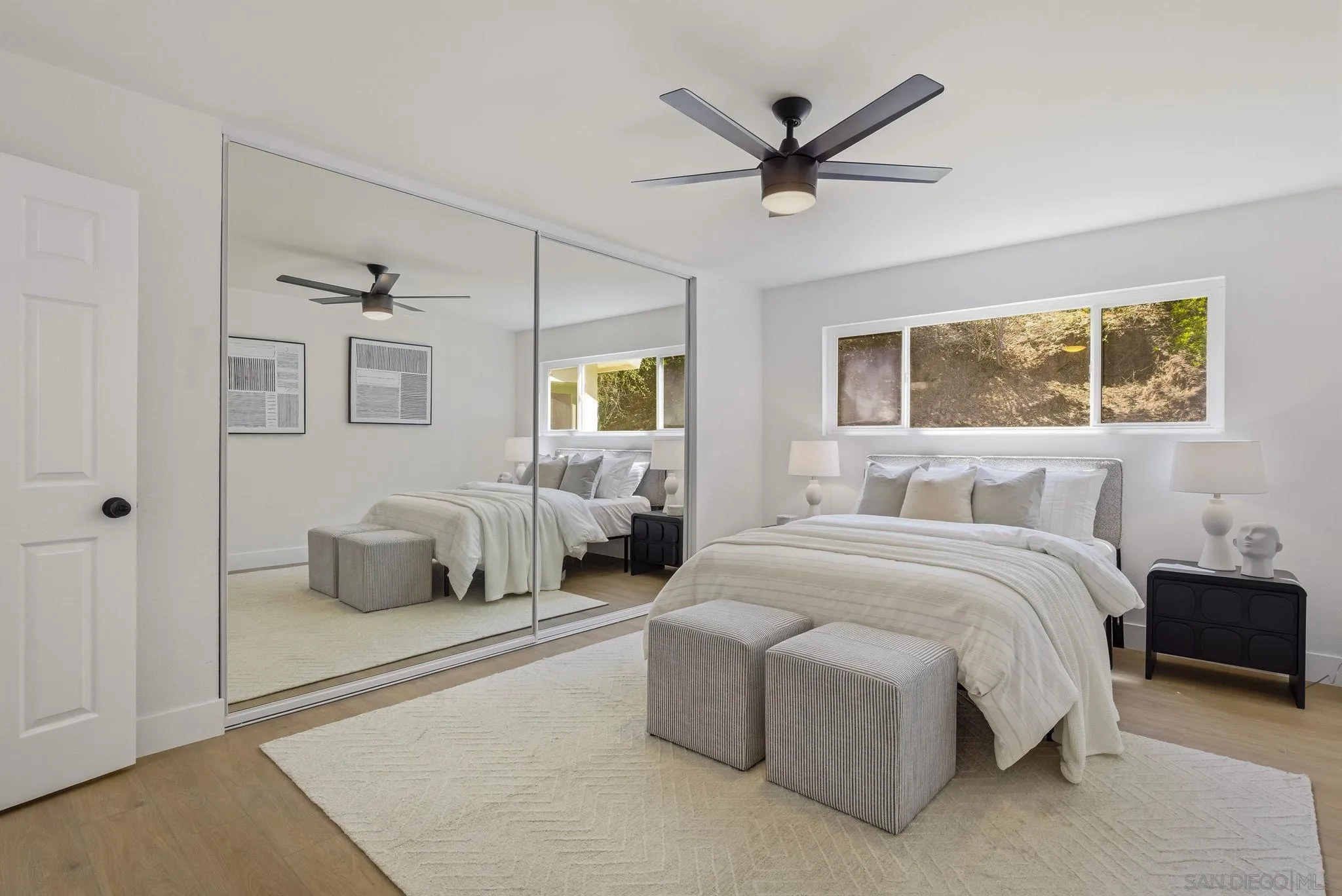 1198 Benjamin Place El Cajon, CA 92020 - Photo 13 of 38 a spacious bedroom with a bed and window