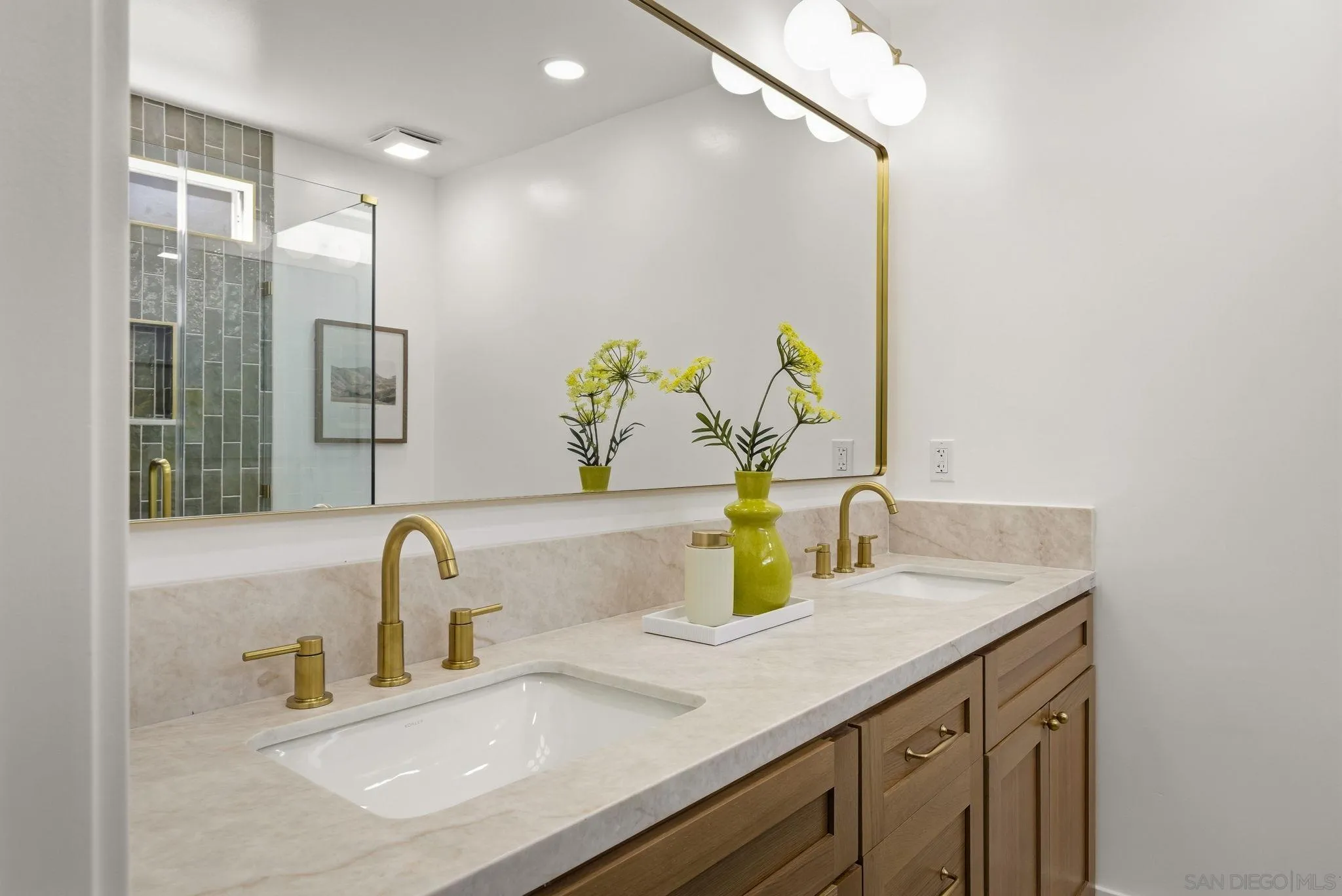 1198 Benjamin Place El Cajon, CA 92020 - Photo 16 of 38 a bathroom with a sink and a mirror