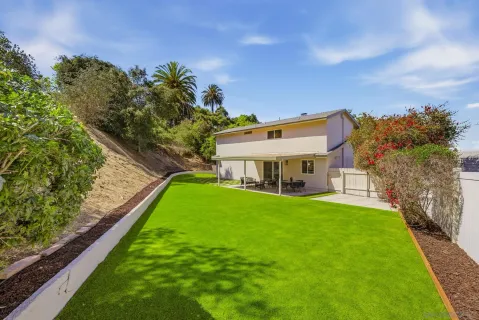 a patio with table and chairs