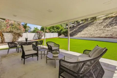 a view of a back yard of the house