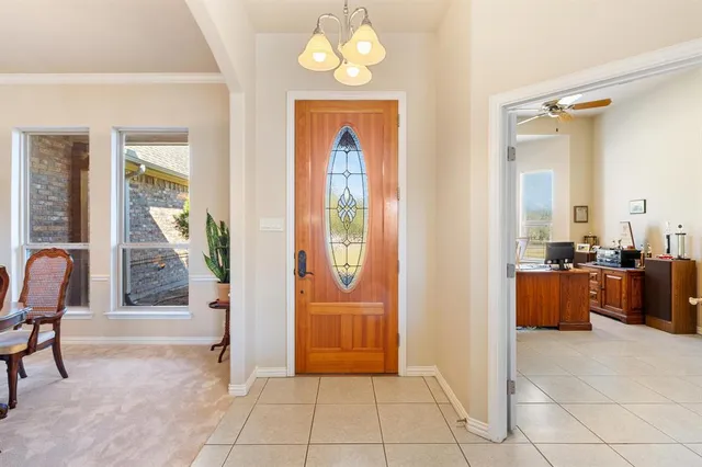 a view of an entryway with a livingroom
