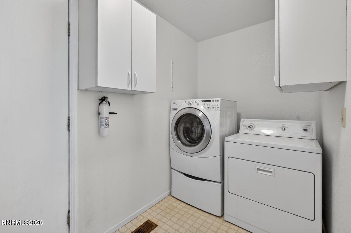 1254 Stephanie Way Minden, NV 89423 - Photo 25 of 30 a utility room with dryer and washer