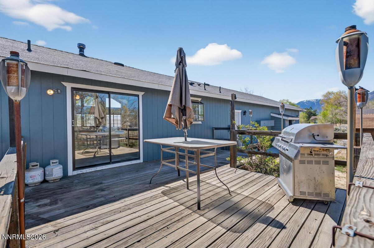 1254 Stephanie Way Minden, NV 89423 - Photo 28 of 30 a view of a roof deck with table and chairs