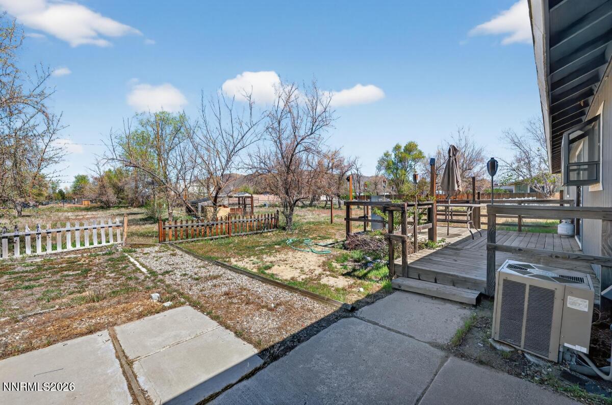 1254 Stephanie Way Minden, NV 89423 - Photo 29 of 30 a view of a backyard with wooden fence
