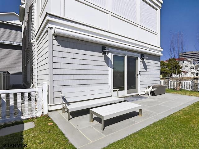 146 Ridgeway Avenue Atlantic City, NJ 08401 - Photo 18 of 59 a view of a patio with a chairs and table in the patio