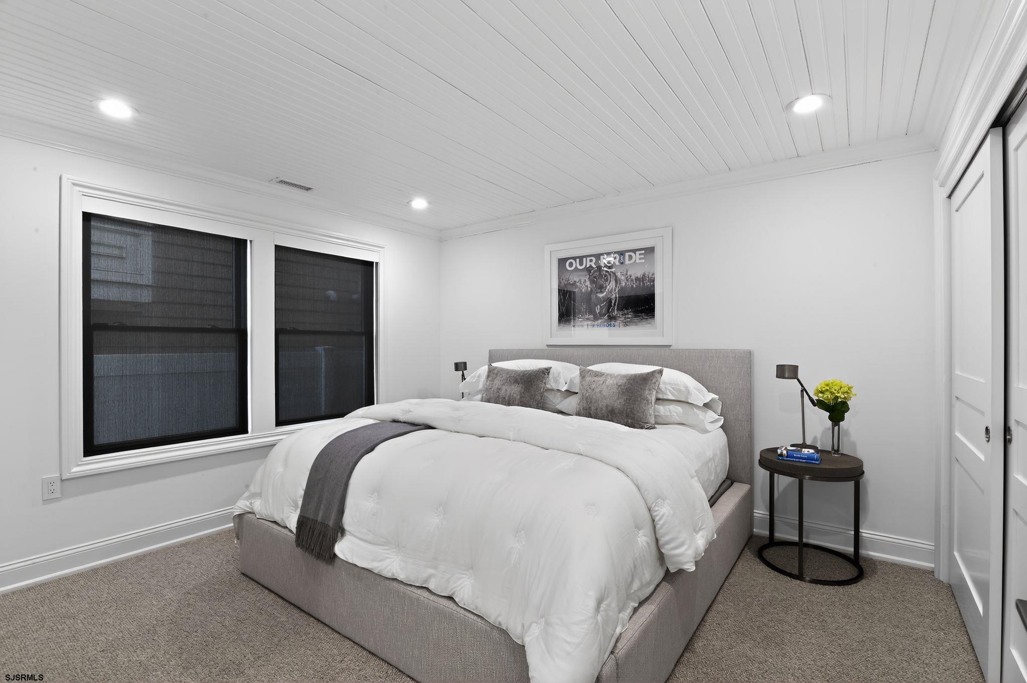 146 Ridgeway Avenue Atlantic City, NJ 08401 - Photo 29 of 59 a bedroom with a bed and a window