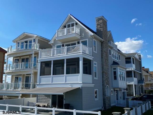 146 Ridgeway Avenue Atlantic City, NJ 08401 - Photo 3 of 59 a front view of a building with a lot of windows