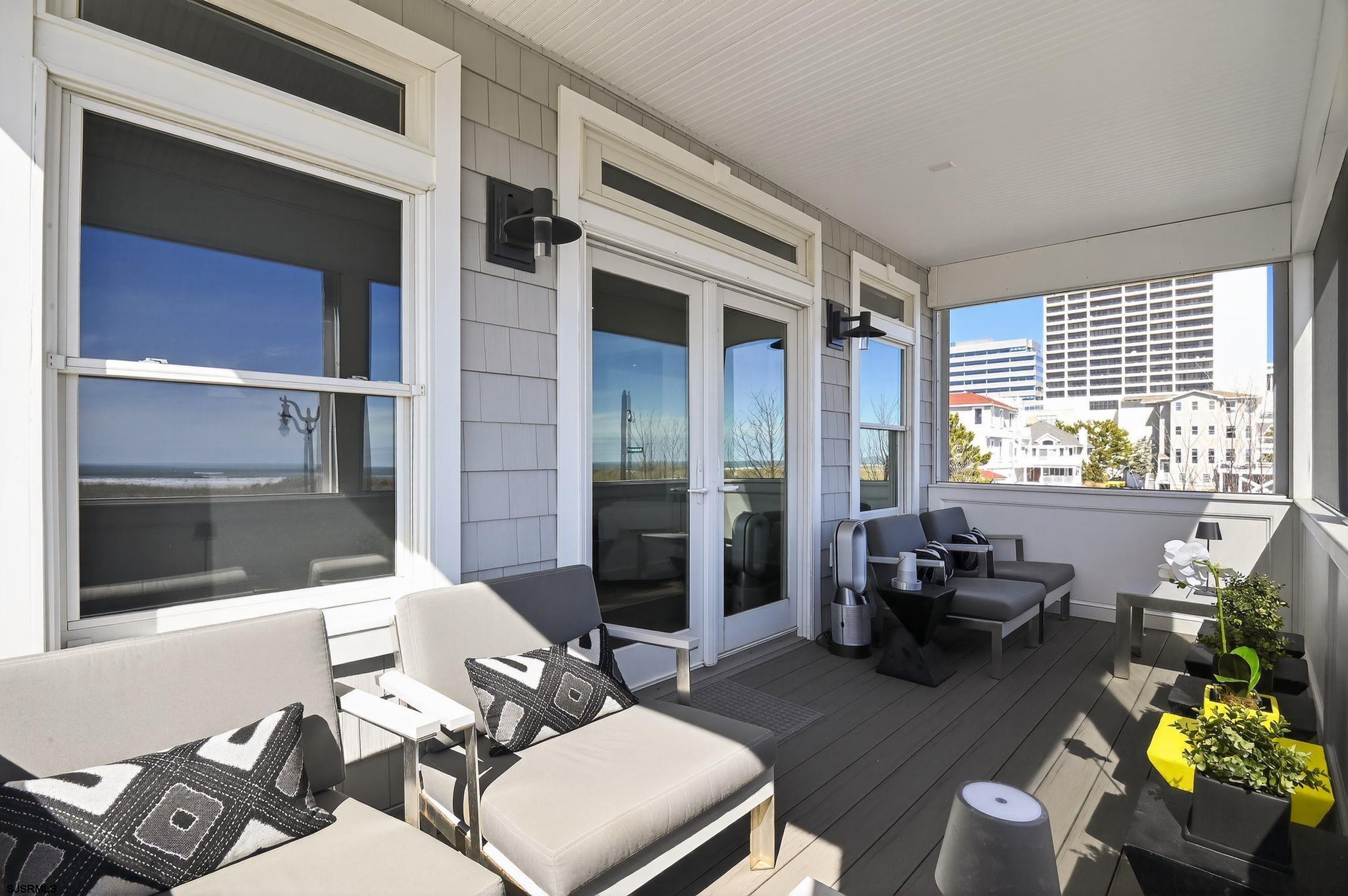 146 Ridgeway Avenue Atlantic City, NJ 08401 - Photo 34 of 59 a living room with furniture and a large window